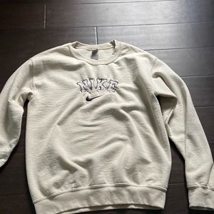 woman’s nike embroidered sweater